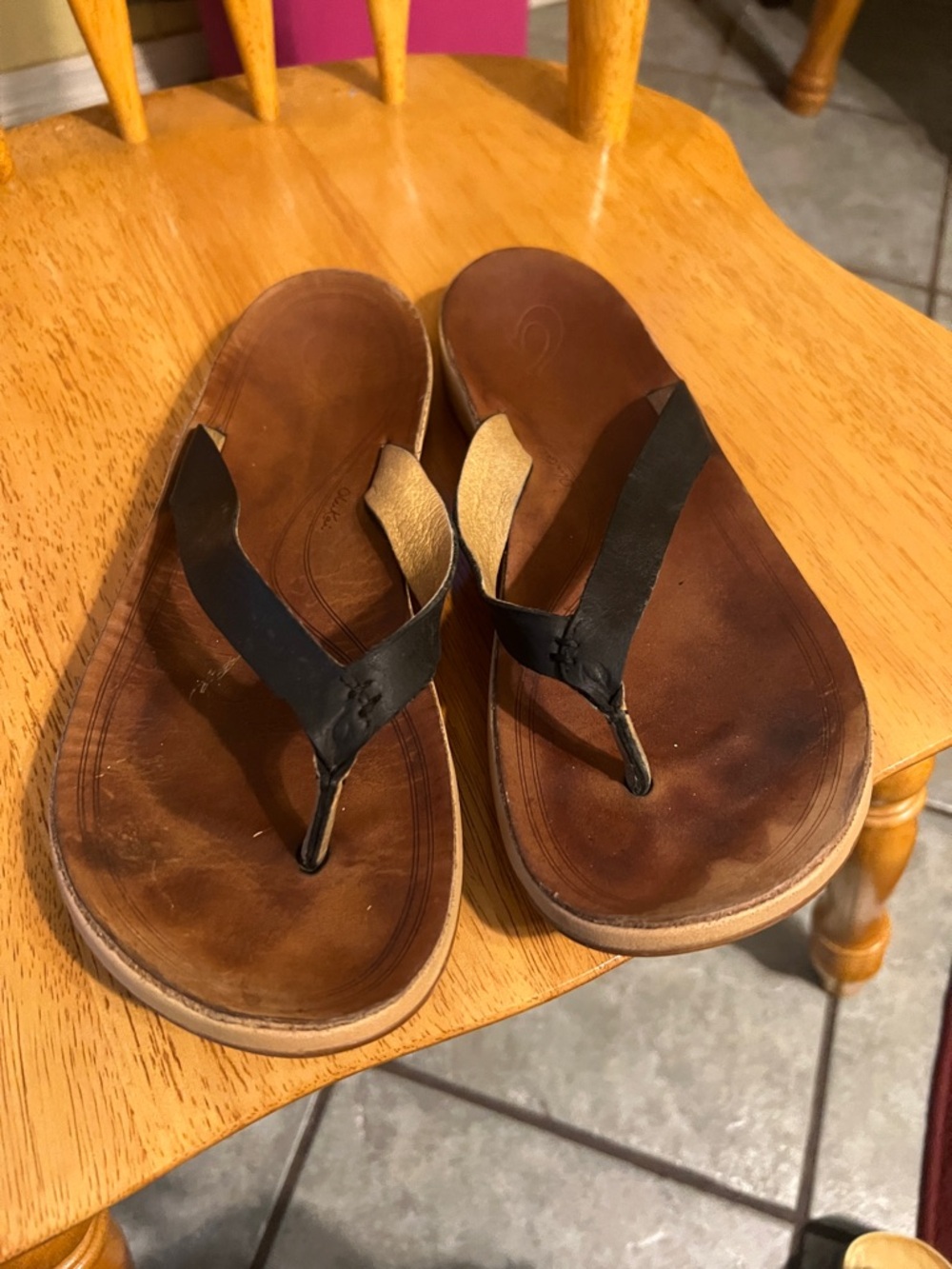 OluKai Women's Leather Thong Sandals in Brown and Black